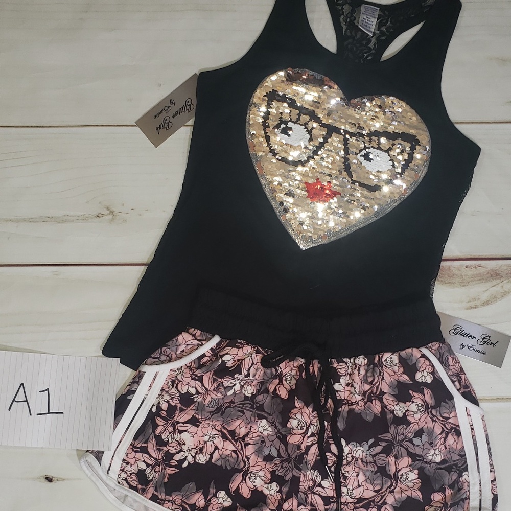 Sleeveless lace back tank and flower shorts